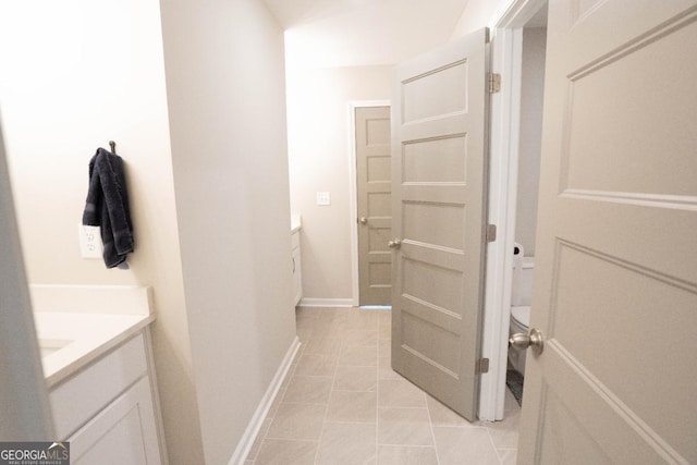 337 Paynes Lake Rd, Carrollton, GA 30116 - bathroom featuring vanity, tile patterned floors, toilet, and baseboards