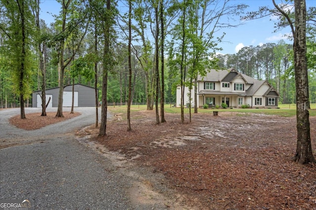 337 Paynes Lake Rd, Carrollton, GA 30116 - view of front of property with an outdoor structure, driveway, and a detached garage