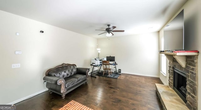 8744 Hamil Ct, Douglasville, GA 30135 - sitting room with a ceiling fan, an office area, wood-type flooring, and a fireplace