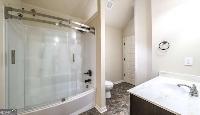 8744 Hamil Ct, Douglasville, GA 30135 - bathroom with toilet, vanity, combined bath / shower with glass door, lofted ceiling, and baseboards
