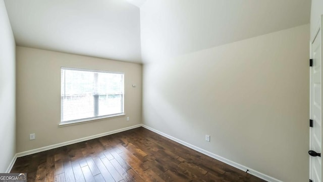 8744 Hamil Ct, Douglasville, GA 30135 - spare room with dark wood-style floors and baseboards