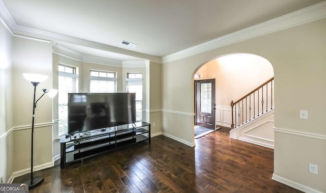 8744 Hamil Ct, Douglasville, GA 30135 - living area with arched walkways, hardwood / wood-style floors, ornamental molding, stairs, and baseboards