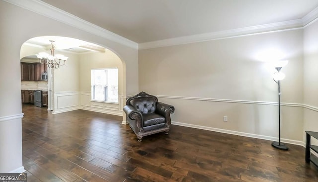 8744 Hamil Ct, Douglasville, GA 30135 - unfurnished room featuring arched walkways, a chandelier, ornamental molding, and dark wood-style flooring