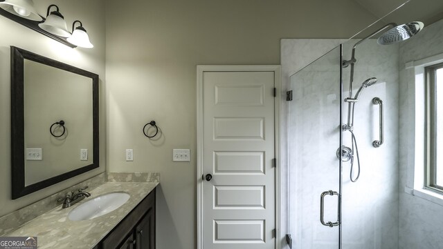 8744 Hamil Ct, Douglasville, GA 30135 - bathroom featuring a stall shower and vanity