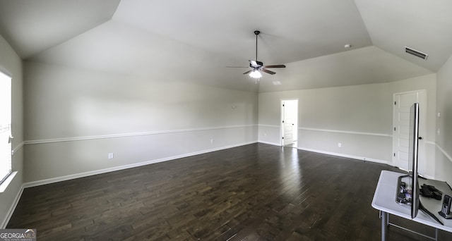8744 Hamil Ct, Douglasville, GA 30135 - unfurnished living room with vaulted ceiling, dark wood-style flooring, a ceiling fan, and baseboards