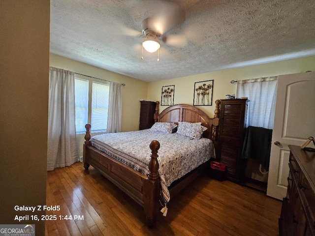 30 Glen View Dr NE, Rome, GA 30165 - bedroom with a textured ceiling, hardwood / wood-style floors, and a ceiling fan