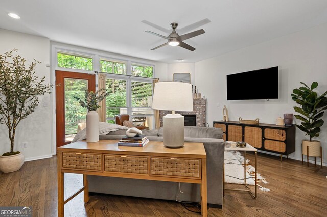 1308 NE Fernwood Cir NE, Atlanta, GA 30319 - living area featuring ceiling fan, a fireplace, wood finished floors, recessed lighting, and baseboards