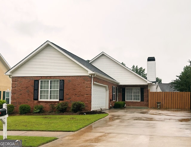 165 Woodgate Cir, Fayetteville, GA 30214 - ranch-style house with an attached garage, brick siding, and concrete driveway