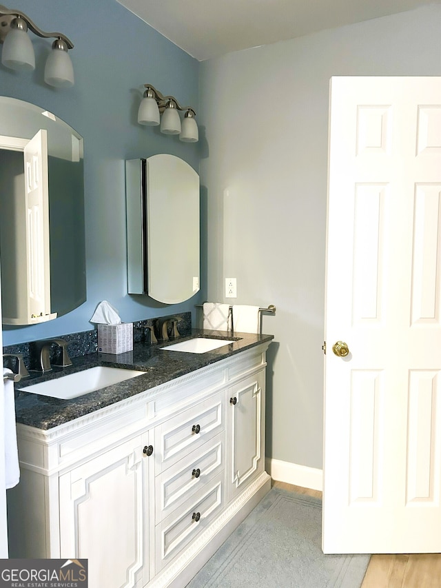 165 Woodgate Cir, Fayetteville, GA 30214 - full bath with double vanity and baseboards