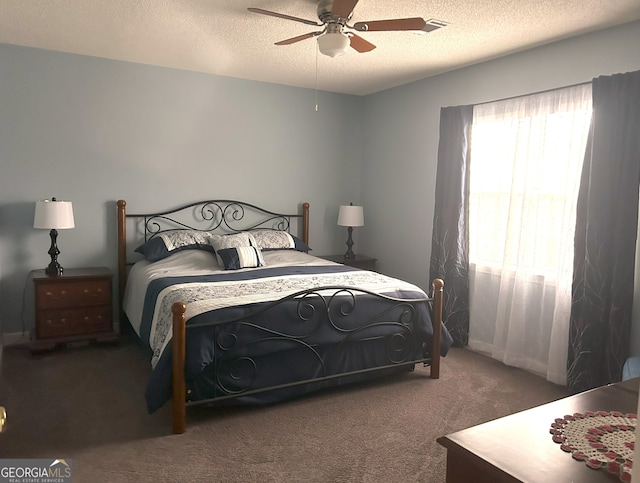 165 Woodgate Cir, Fayetteville, GA 30214 - carpeted bedroom with a textured ceiling and a ceiling fan