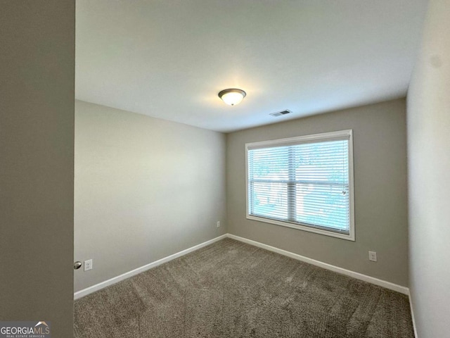 364 Dublin Way, Dallas, GA 30132 - carpeted spare room with baseboards