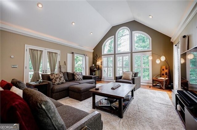 3620 Chartwell Dr, Suwanee, GA 30024 - living room with french doors, high vaulted ceiling, light wood-type flooring, and recessed lighting