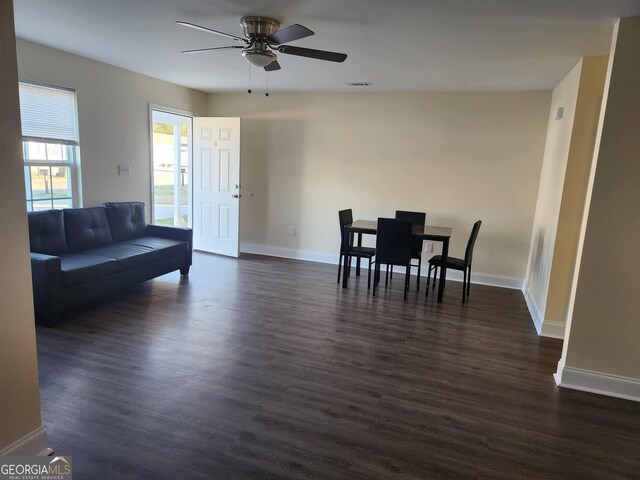 108 Ronald Pride, Fort Valley, GA 31030 - living area featuring baseboards, ceiling fan, and dark wood-style floors