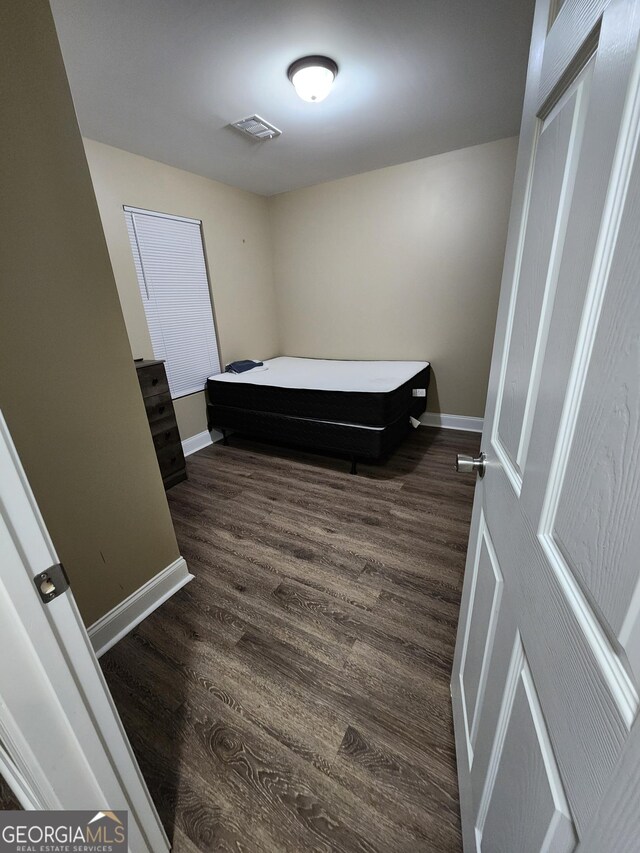 108 Ronald Pride, Fort Valley, GA 31030 - bedroom featuring baseboards and wood finished floors