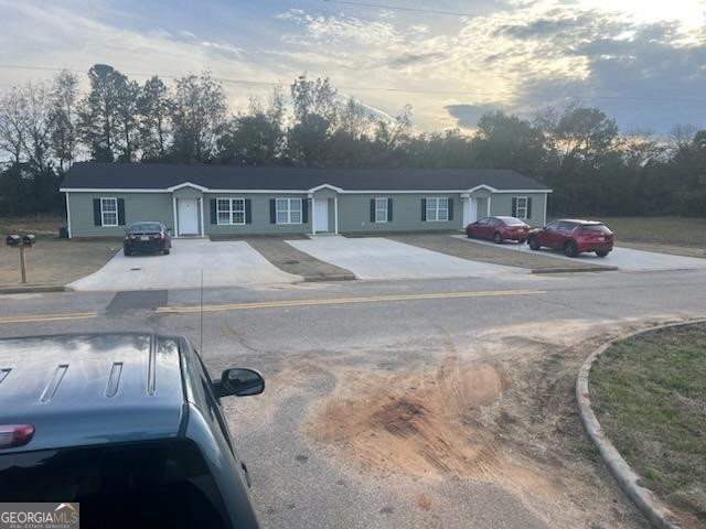 108 Ronald Pride, Fort Valley, GA 31030 - view of front facade featuring view of wooded area