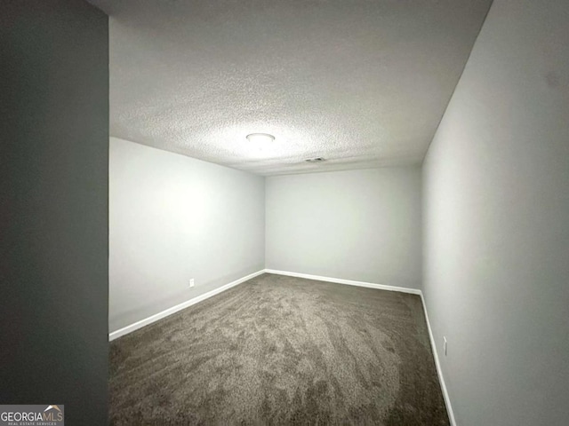 3170 W Point Cir, Douglasville, GA 30135 - carpeted empty room featuring baseboards and a textured ceiling