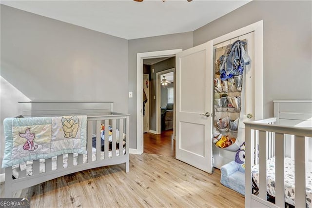 118 Greenwood St, Fairburn, GA 30213 - bedroom with light wood finished floors and baseboards