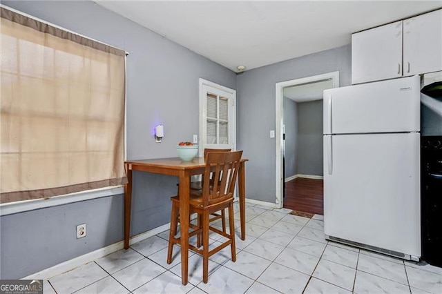 118 Greenwood St, Fairburn, GA 30213 - dining room featuring baseboards