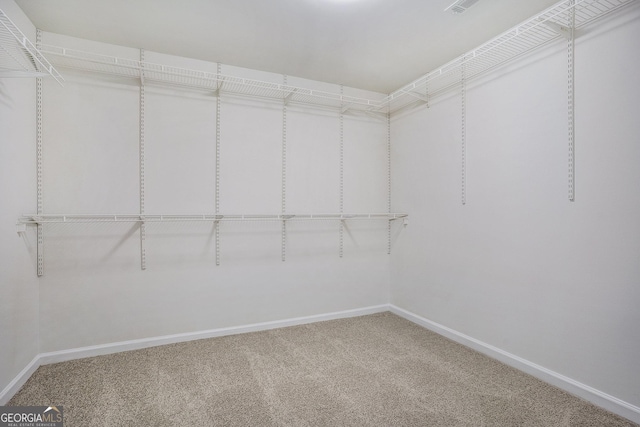 2681 Lakeside Dr SW, Conyers, GA 30094 - spacious closet featuring carpet floors