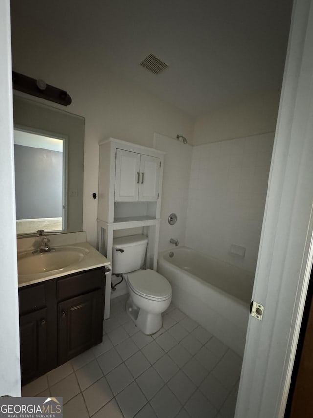 1031 Jordan Rd, Dacula, GA 30019 - full bath featuring tile patterned flooring, toilet, vanity, and tub / shower combination