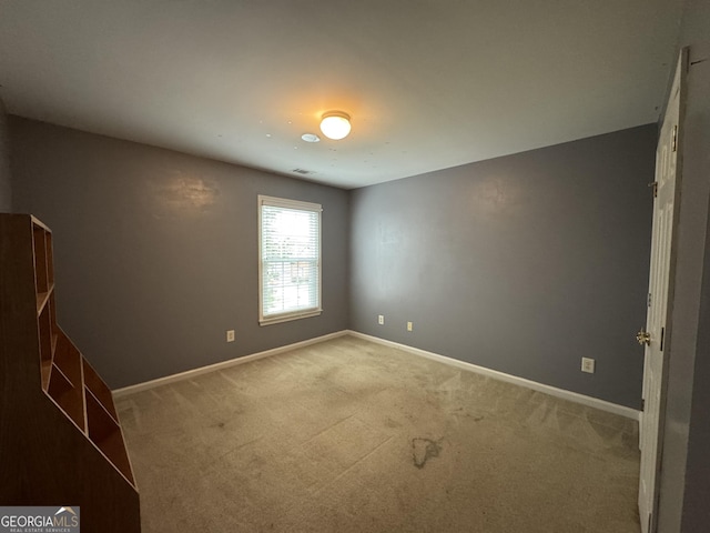 1031 Jordan Rd, Dacula, GA 30019 - spare room with carpet flooring and baseboards
