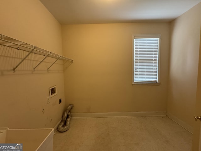 1031 Jordan Rd, Dacula, GA 30019 - laundry area featuring washer hookup, electric dryer hookup, and baseboards
