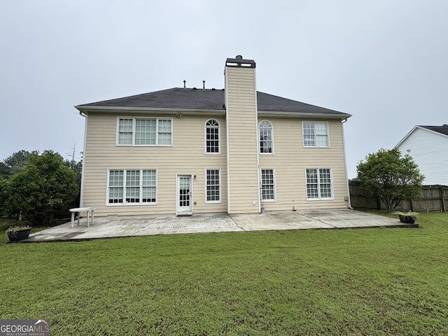 1031 Jordan Rd, Dacula, GA 30019 - rear view of house featuring a patio area and a chimney