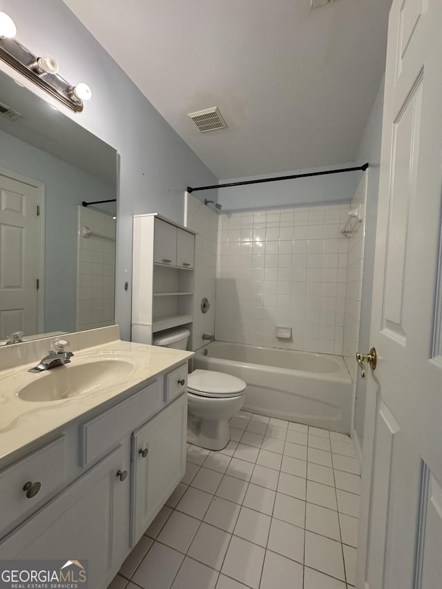 1031 Jordan Rd, Dacula, GA 30019 - full bathroom with tile patterned floors, vanity, washtub / shower combination, and toilet