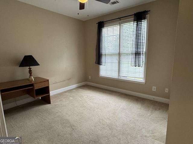 1031 Jordan Rd, Dacula, GA 30019 - unfurnished room featuring ceiling fan, baseboards, plenty of natural light, and carpet