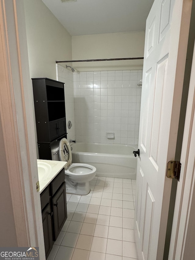 1031 Jordan Rd, Dacula, GA 30019 - bathroom with tile patterned floors, vanity, toilet, and shower / washtub combination