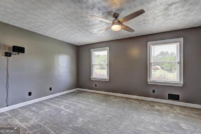 108 Country Acres Ct, Mcdonough, GA 30253 - carpeted empty room with a ceiling fan, baseboards, and a textured ceiling