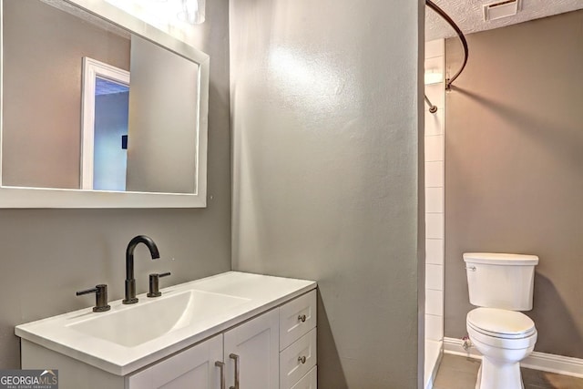 108 Country Acres Ct, Mcdonough, GA 30253 - full bathroom with toilet, vanity, a shower, and baseboards
