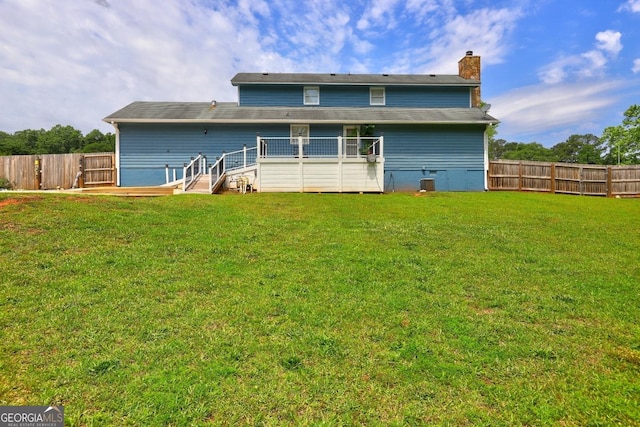 108 Country Acres Ct, Mcdonough, GA 30253 - rear view of house featuring a chimney and central AC unit