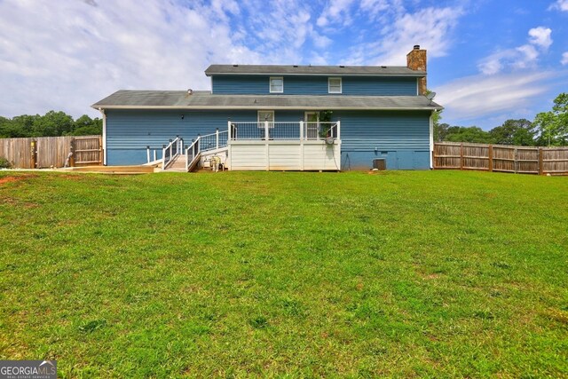 108 Country Acres Ct, Mcdonough, GA 30253 - rear view of house featuring a chimney and central AC unit