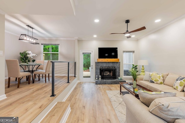 2012 Variations Dr NE, Atlanta, GA 30329 - living room featuring ornamental molding, wood finished floors, baseboards, a ceiling fan, and recessed lighting