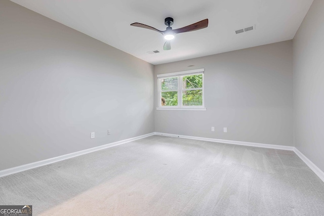 2012 Variations Dr NE, Atlanta, GA 30329 - carpeted empty room with a ceiling fan and baseboards
