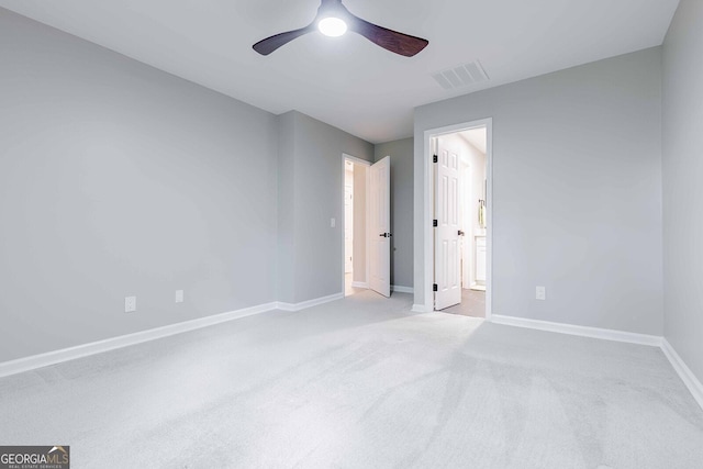 2012 Variations Dr NE, Atlanta, GA 30329 - unfurnished bedroom with carpet flooring, baseboards, ensuite bath, and a ceiling fan