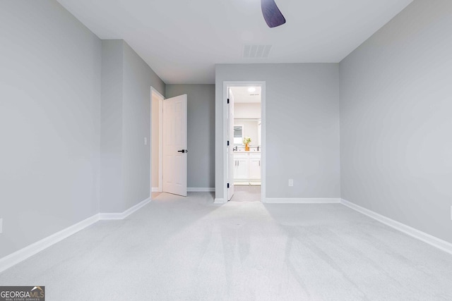 2012 Variations Dr NE, Atlanta, GA 30329 - unfurnished bedroom with carpet, baseboards, ensuite bath, and ceiling fan