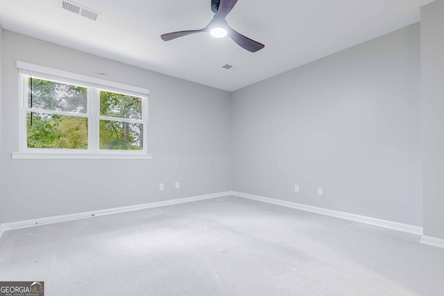 2012 Variations Dr NE, Atlanta, GA 30329 - carpeted spare room featuring baseboards and ceiling fan