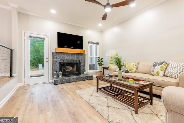 2012 Variations Dr NE, Atlanta, GA 30329 - living area with a ceiling fan, crown molding, wood finished floors, a fireplace, and baseboards