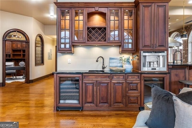 3180 Mathieson Dr NE Unit 1401, Atlanta, GA 30305 - indoor wet bar featuring wine cooler, light wood-type flooring, and baseboards