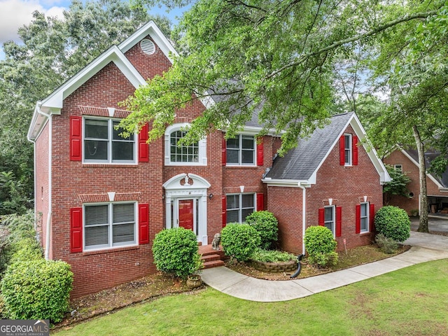 5190 Beech Forest Dr, Lilburn, GA 30047 - view of front of house with brick siding and a front lawn