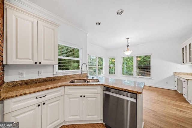 5190 Beech Forest Dr, Lilburn, GA 30047 - kitchen with dishwasher, a sink, plenty of natural light, light stone countertops, and ornamental molding