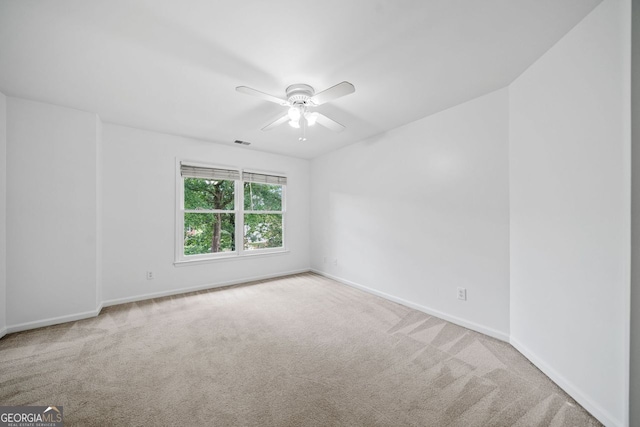 5190 Beech Forest Dr, Lilburn, GA 30047 - empty room featuring carpet floors, baseboards, and a ceiling fan