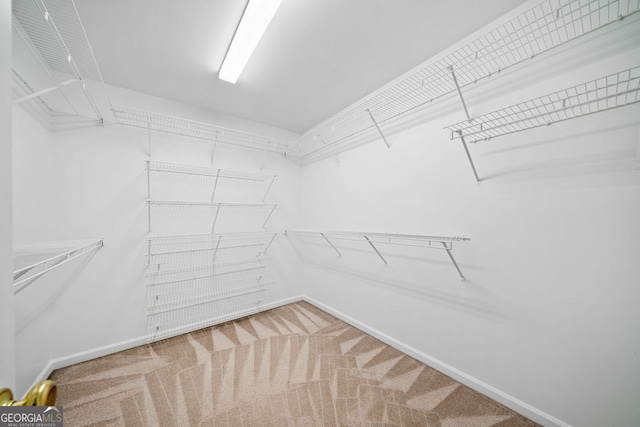 5190 Beech Forest Dr, Lilburn, GA 30047 - walk in closet featuring carpet flooring