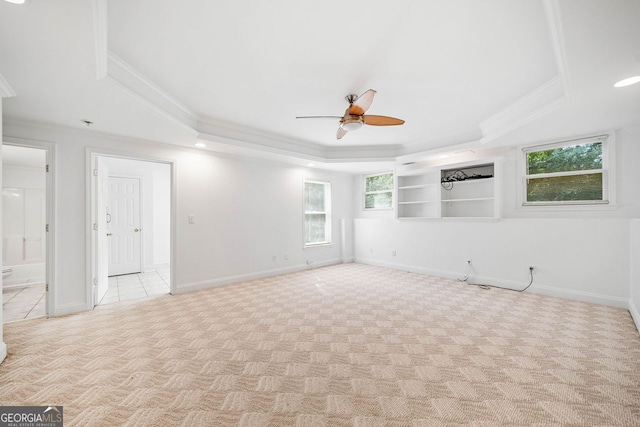 5190 Beech Forest Dr, Lilburn, GA 30047 - unfurnished room with a tray ceiling, crown molding, ceiling fan, and carpet flooring