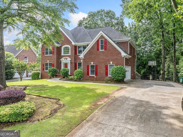 5190 Beech Forest Dr, Lilburn, GA 30047 - view of front of house featuring concrete driveway, brick siding, a front yard, and a garage