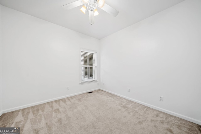 5190 Beech Forest Dr, Lilburn, GA 30047 - spare room with carpet floors and ceiling fan