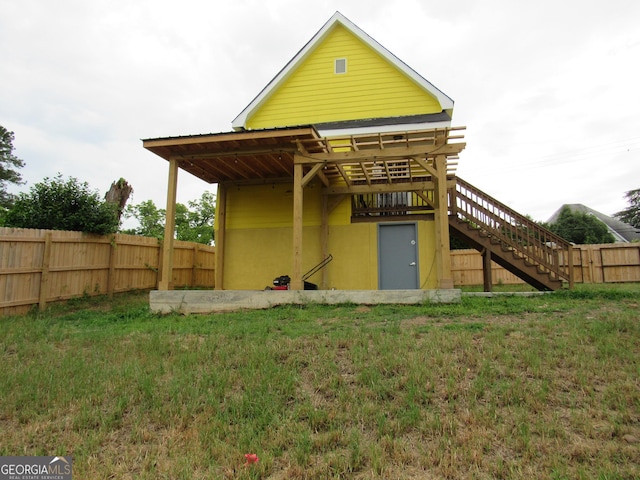 791 Anderson St, Macon, GA 31201 - back of property featuring stairway and a wooden deck