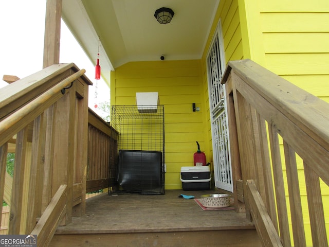 791 Anderson St, Macon, GA 31201 - property entrance featuring a deck and a security system